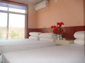 Penglai Maosheng Fisher Apartment Hotel Esterno foto